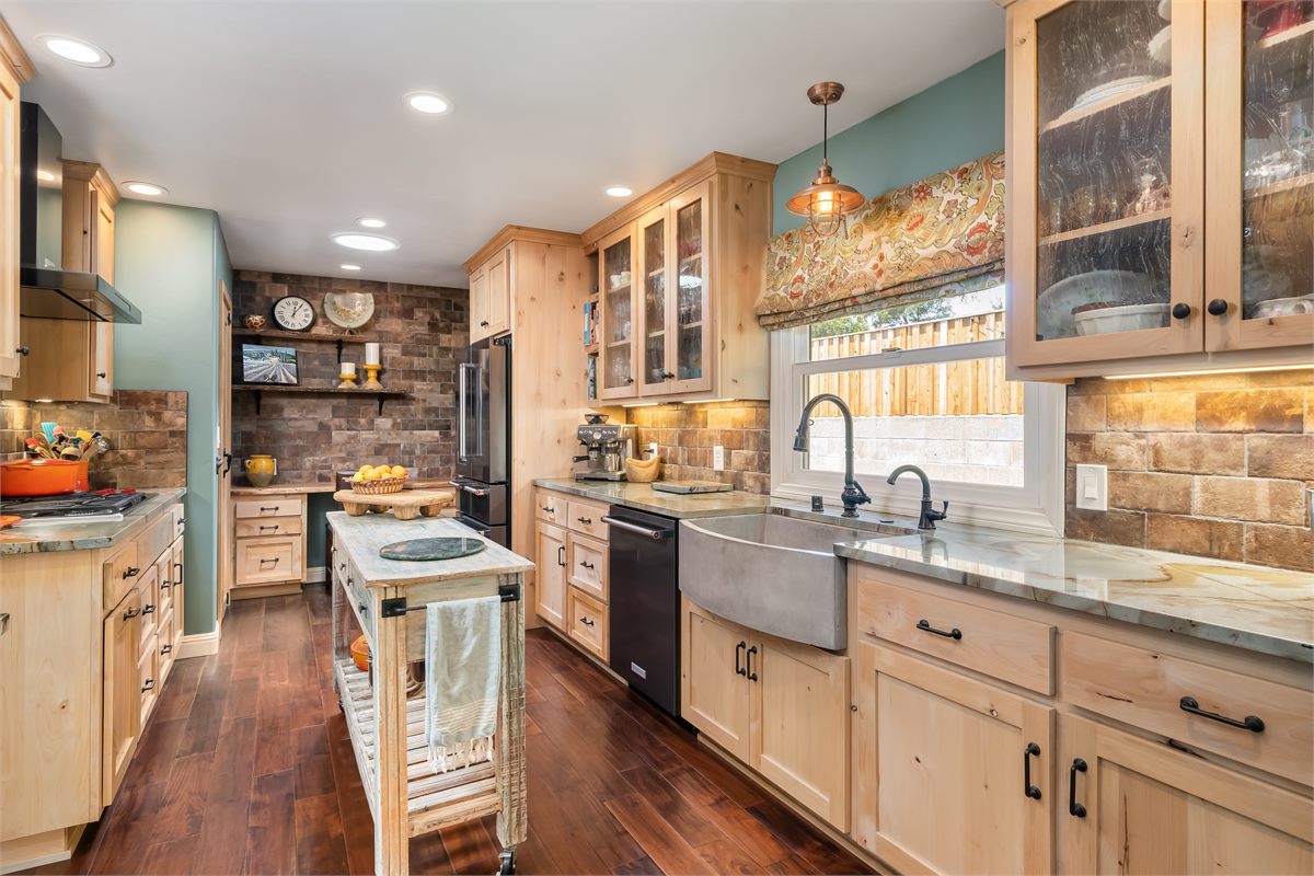A rustic kitchen detailed top to bottom, appliances cleaned inside and out